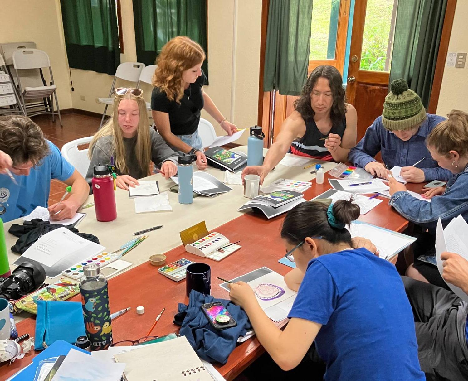 photo of group at a table in Costa Rica